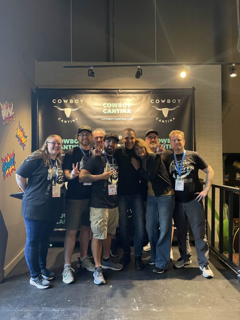 Group photo of the Metal Ninja Studios team at their San Diego Comic-Con Mixer at the Cowboy with Todd McFarlane and his wife.